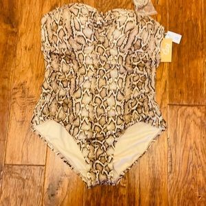 One piece swimming suit. Size XL